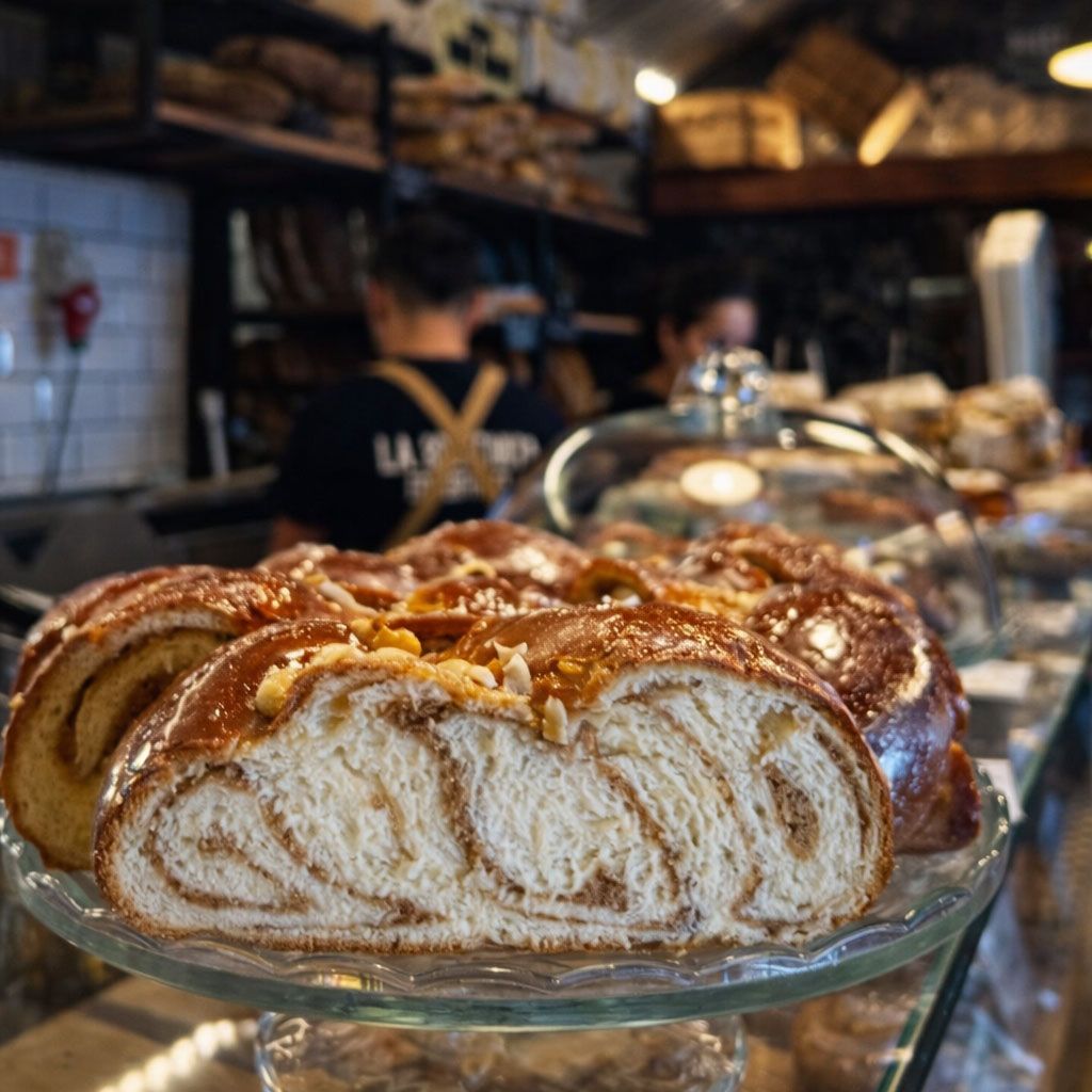 lalacena-bolleria Freshly sliced artisan braided pastry by Mario Bakes at Lalacena.